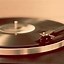 Image result for Turntable Record Player with Golden and Black Background