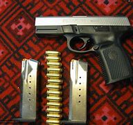 Image result for Smith and Wesson 40 Cal Semi Auto