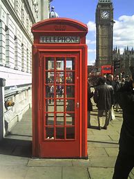 Image result for British Telephone Box with a Phone in It