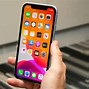 Image result for iPhone Orange XR vs iPhone 11 Terquise