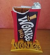 Image result for Willy Wonka Eats Flower