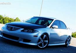 Image result for 2003 Mazda 6s Speed Yellow