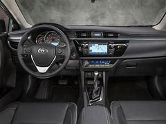 Image result for 2016 Toyota Corolla White Tan Interior