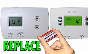 Image result for How to Change Honeywell Thermostat Battery