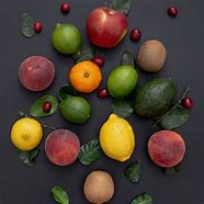 Image result for Fruit Flat Lay Photography Orange and Kiwi