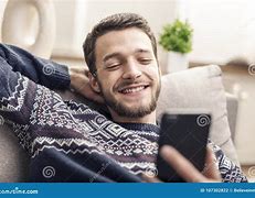 Image result for Picture of Guy Holding Her Phone Smiling