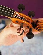 Image result for Tuner for a Violin