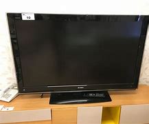 Image result for Sharp AQUOS 52 Inch TV Stand