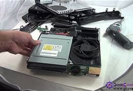 Image result for Xbox 360 Slim Disc Drive Motor Spindle Tear Down