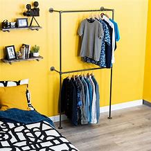 Image result for Clothes Hanger Rack W Storage Drawers