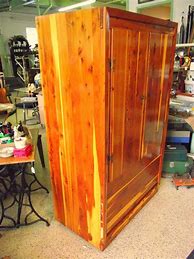 Image result for Cedar Wardrobe Closet with Bottom Drawer