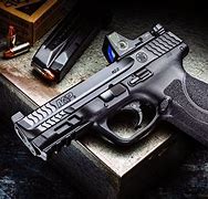 Image result for Smith and Wesson 9Mm Compact Size