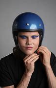 Image result for Man with Motorcycle Helmet