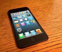 Image result for Apple iPod Touch 5 Next to iPod Clasic 7