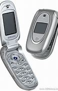 Image result for Silver and Blue Flip Phone