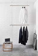 Image result for Hanging Clothes Rack From Ceiling