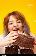 Image result for Eating a Large Cake