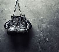 Image result for Boxing Gloves Hanging Black Background