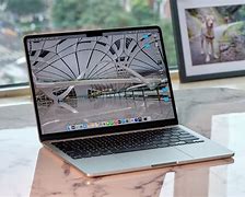 Image result for iPhone 12 and MacBook M2