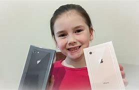 Image result for 8 Year Old with iPhone