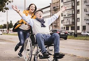Image result for Pushing Someone in a Wheelchair
