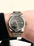 Image result for Rolex Fluted Oyster Perpetual Rhodium Fluted