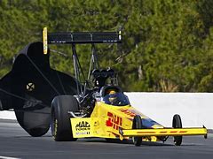 Image result for NHRA Dragster with Gold Wheels