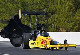 Image result for Funny Cars and Top Fuel Dragsters