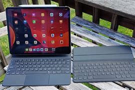 Image result for iPad Pro Magic Keyboard Wireless Charging