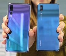 Image result for iPhone XVS Huawei P20