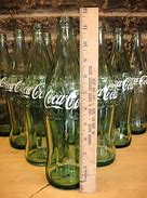 Image result for 600Ml Coke Bottle Dimensions