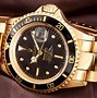 Image result for Gold Rolex Submariner Watch