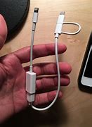 Image result for iPhone Attached to Charger