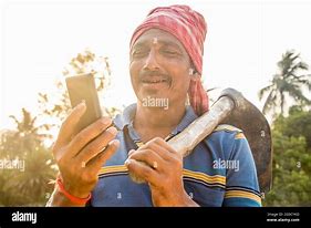 Image result for Image of an Ruapl Indians with Phone