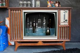 Image result for Bar with Box TV