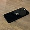 Image result for Black iPhone On Table