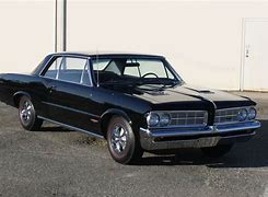 Image result for Black GTO at the Drag Strip