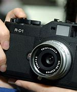 Image result for First Mirrorless Camera