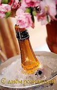 Image result for Champagne with Black Bottle White Flowers