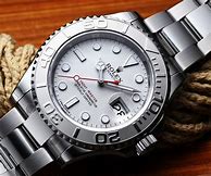 Image result for Silver Rolex Blue Face