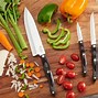 Image result for Chef Knife Cutting Vegetables