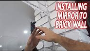 Glass Mirror Installation on BRICK WALL // Adjustable mirror clips