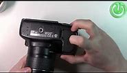 How To Open Battery Slot On Canon 70D Camera