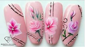 One stroke flowers nail art with acrylic paints.
