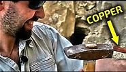 Copper chisel against rock | Geologist against myths