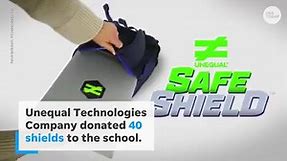 Bulletproof shields given to 8th graders