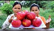 Two girl eating apple sister VS sister - eating Delicious