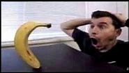 Guy looking at banana with music in the backround