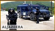 Kosovo: Serbs rally in North Mitrovica against police raids