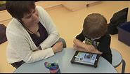 Non-verbal children living with autism learning to communicate via electronic devices